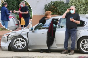William Shatner talking to a woman after a car crash on Tuesday