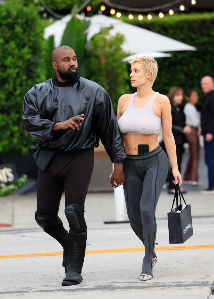 Kanye West and Bianca Censori walking together