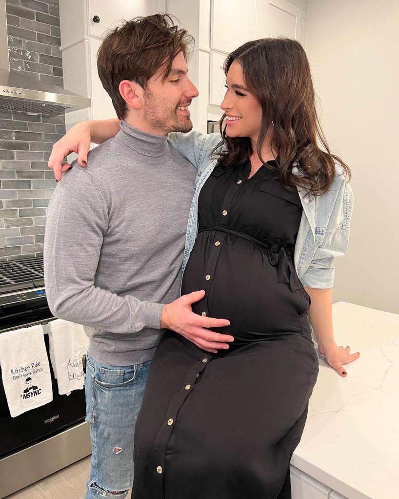 Jared Haibon cradling pregnant Ashley Iaconetti's baby bump.