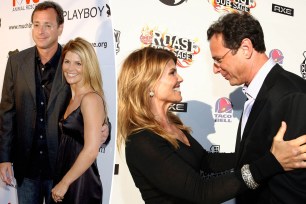 Lori Loughlin on the red carpet with Bob Saget.