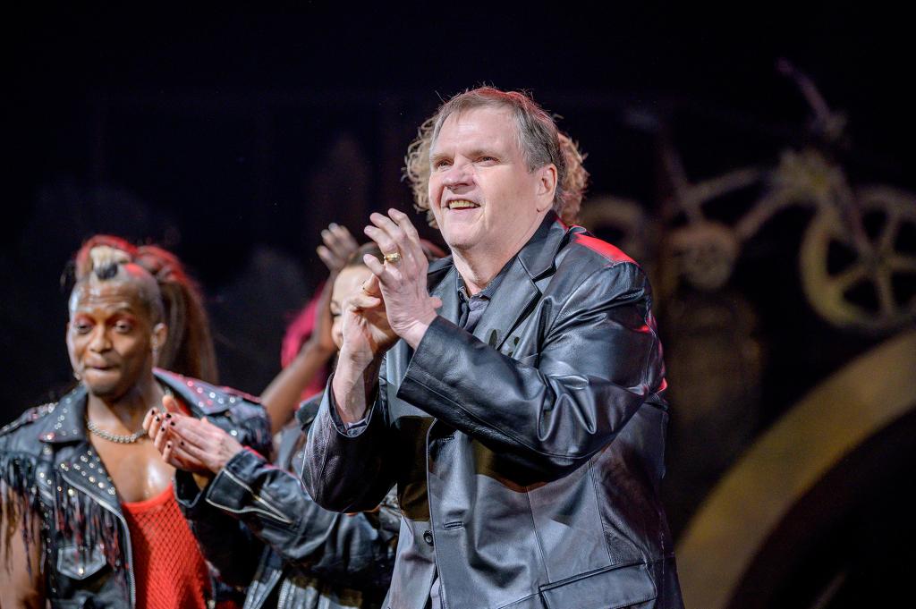 Meat Loaf clapping onstage in 2019.