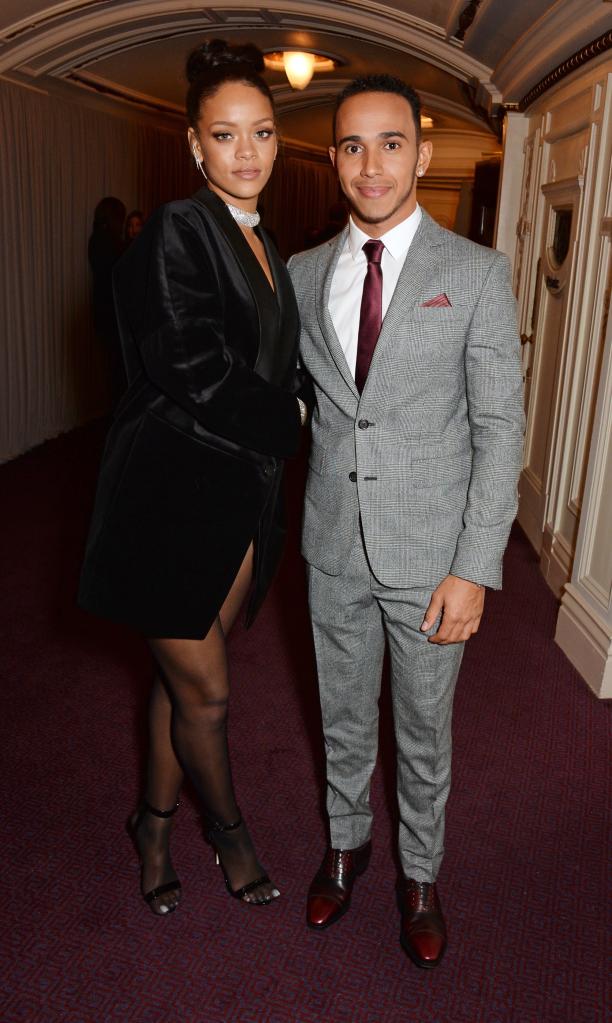 Rihanna and Lewis Hamilton posing together at an event in 2014.