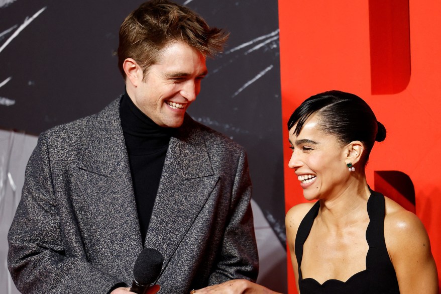 Zoë Kravitz and Robert Pattinson share a laugh at 'The Batman' screening