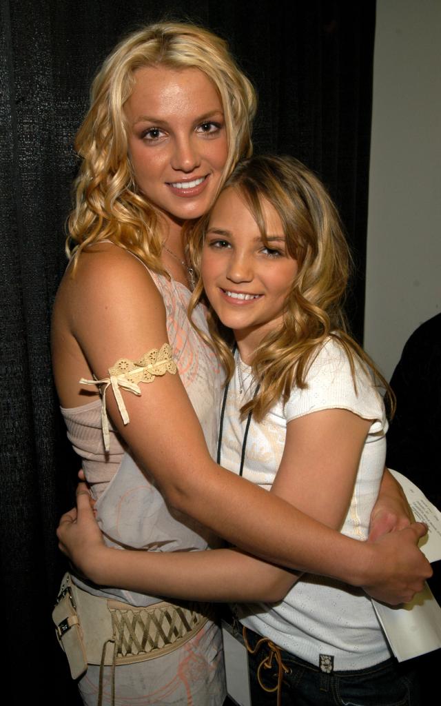 Britney Spears hugging a young Jamie Lynn Spears.