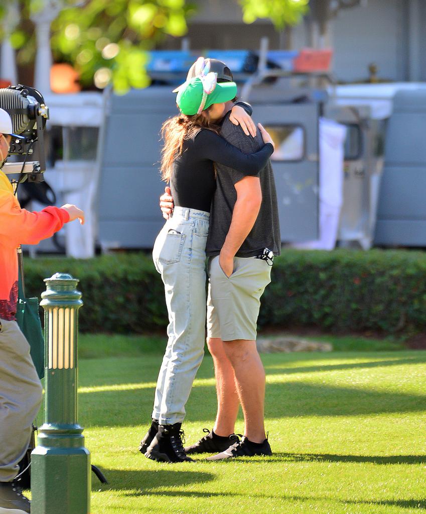 Shailene Woodley hugging Aaron Rodgers.