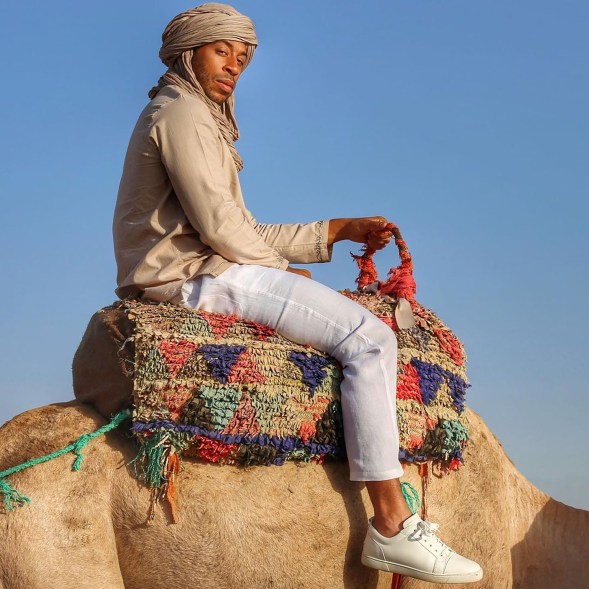 ludacris rides a camel