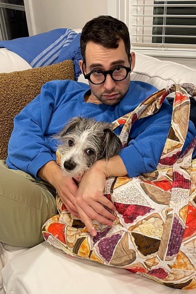 Four eyes: Jack Antonoff snuggles up with designer sis Rachel Antonoff’s pup Lafitte and a sandwich-inspired tote bag.