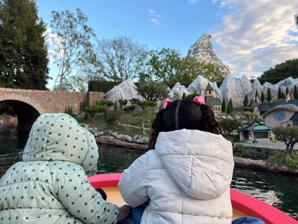 Capri and Bianka on a boat at Disneyland.