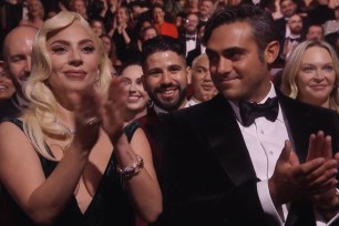 Lady Gaga and Michael Polansky sitting together at the BAFTA Awards 2022.