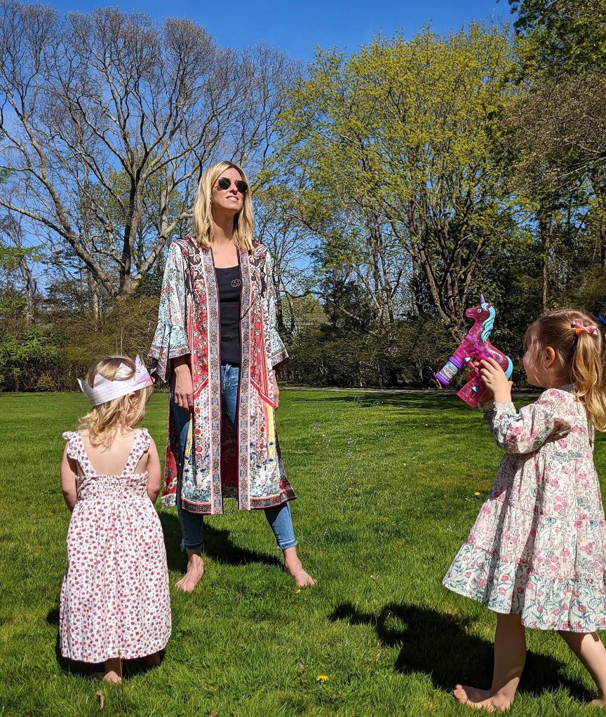 Nicky Hilton plays in the park with her two young daughters