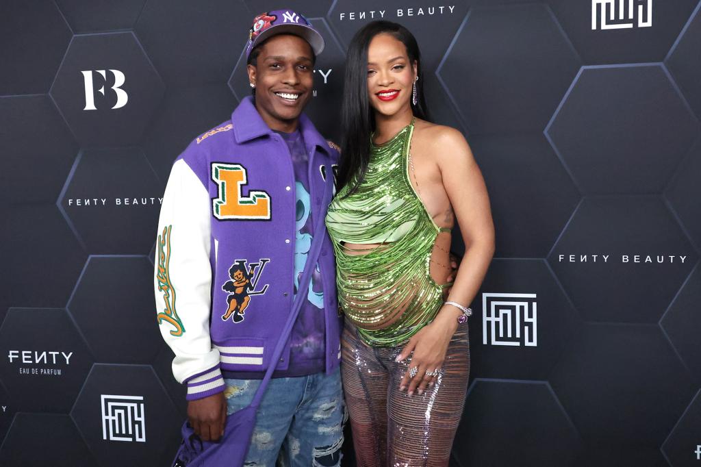 Rihanna and A$AP Rocky on a red carpet in February 2022.