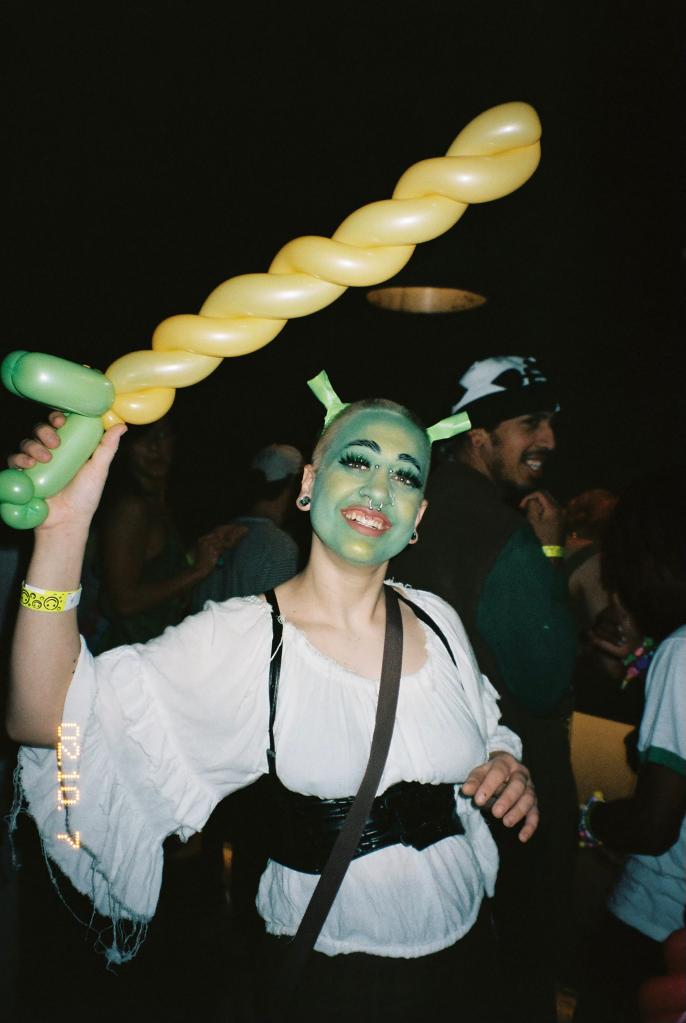 One woman painted her face and dressed as Shrek.