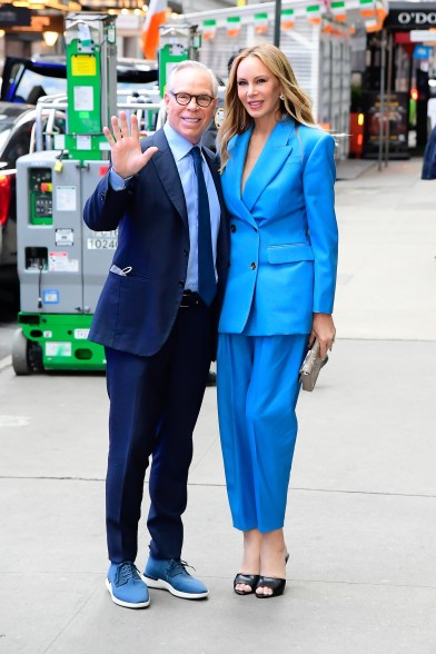 Fashion designer Tommy Hilfiger and his wife, Dee, pose outside of "GMA."