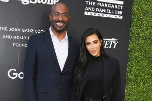 Van Jones and Kim Kardashian posing for a photo together.