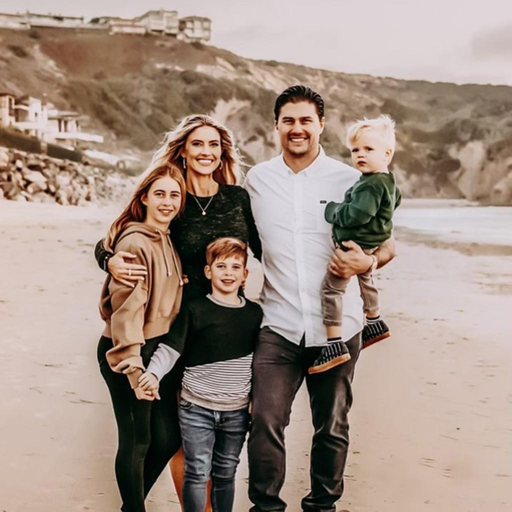 Christina Haack, Joshua Hall and her three kids Taylor, Brayden and and Hudson on the beach.