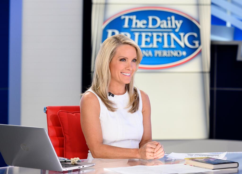 Dana Perino behind the desk in the Fox News studio.