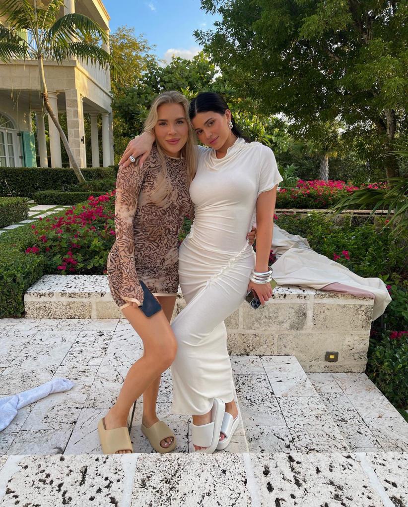 Maguire Grace Amundsen and Kylie Jenner posing outside a villa.