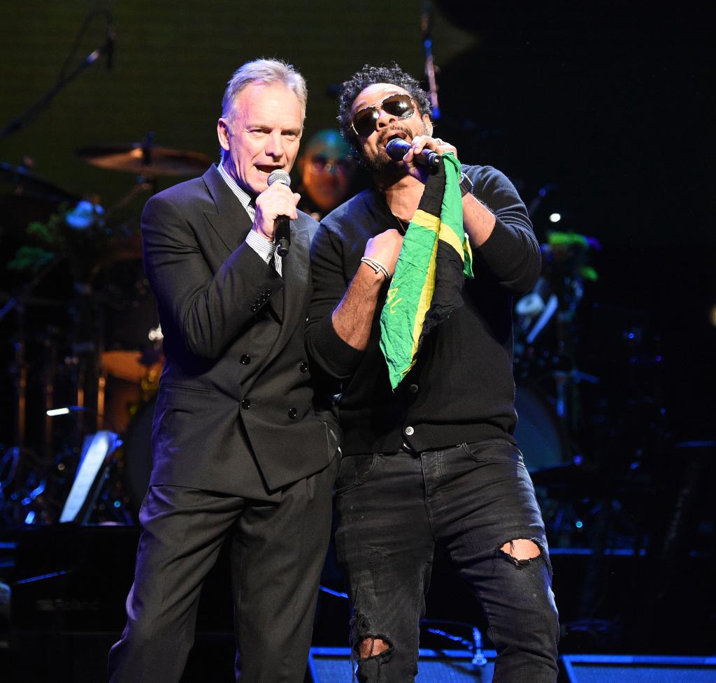 Sting and Shaggy performing together.