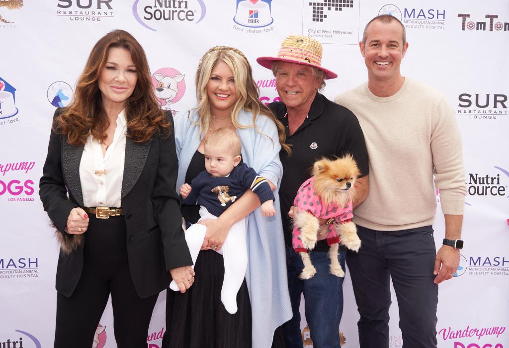 Lisa Vanderpump, Pandora Todd, Ken Todd and Jason Sabo pose for pictures at World Dog Day 2022 along with Pandora and Jason's baby and one of Lisa and Ken's dogs