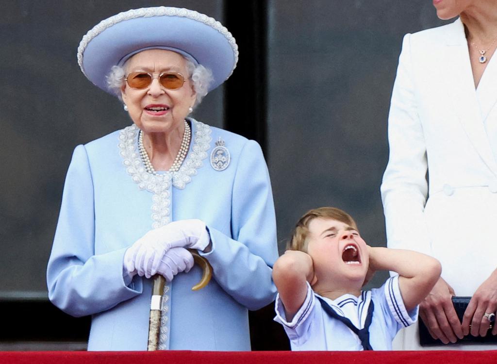 Queen Elizabeth and Prince Louis appear on the balcony of Buckingham Palace as part of Trooping the Colour parade.