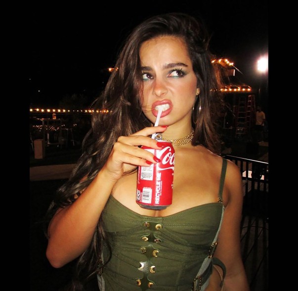 Addison Rae sips a Coke