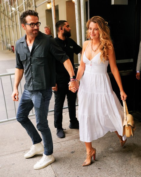 Ryan Reynolds and Blake Lively holding hands