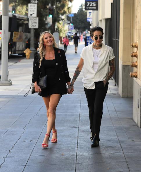 Braunwyn Windham-Burke and Kris holding hands in Los Angeles.