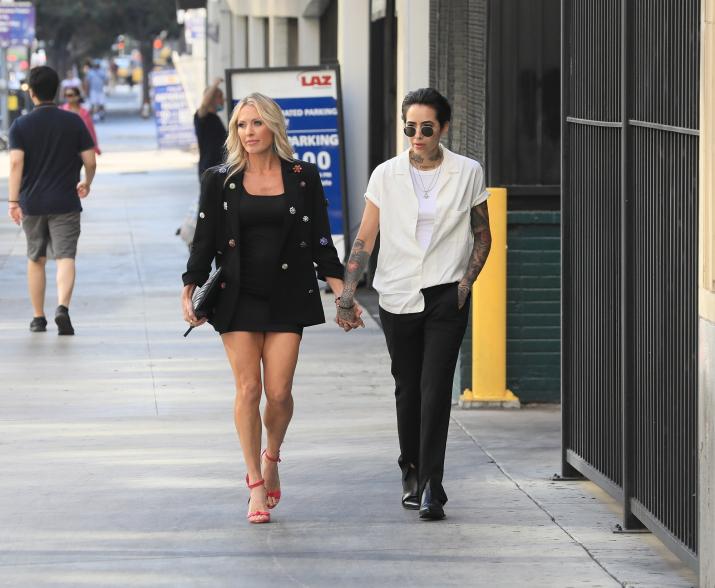 Braunwyn Windham-Burke and Kris holding hands in Los Angeles.