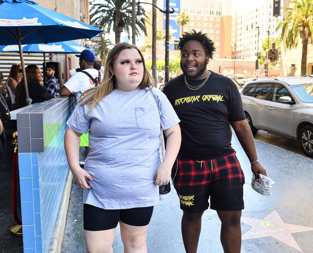 Alana Thompson and Dralin Carswell walking together.