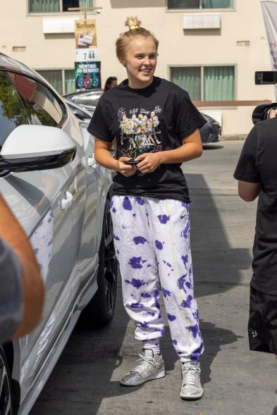 JoJo Siwa pumping gas at a gas station