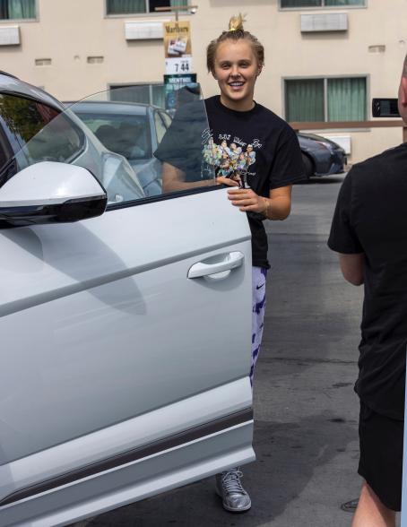 JoJo Siwa pumping gas at a gas station