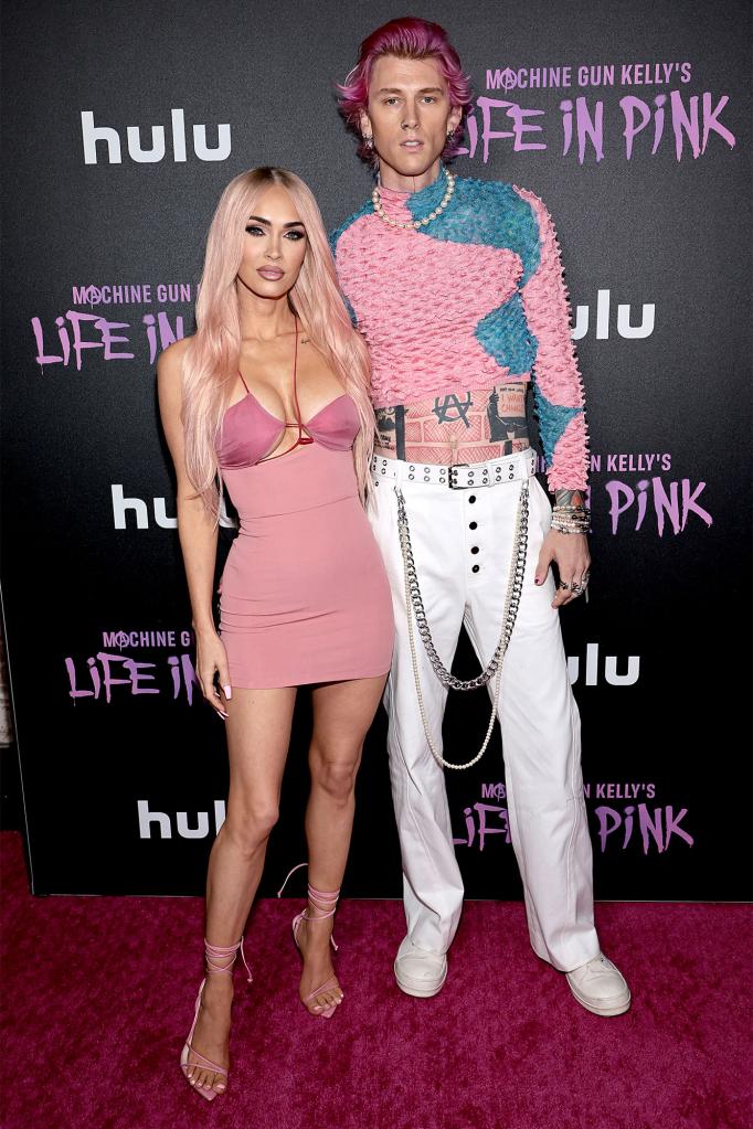 Megan Fox and Machine Gun Kelly on a red carpet.