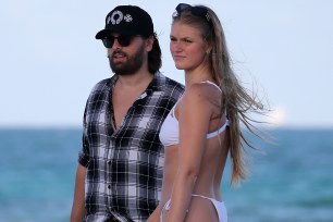 Scott Disick with a mystery woman in Miami
