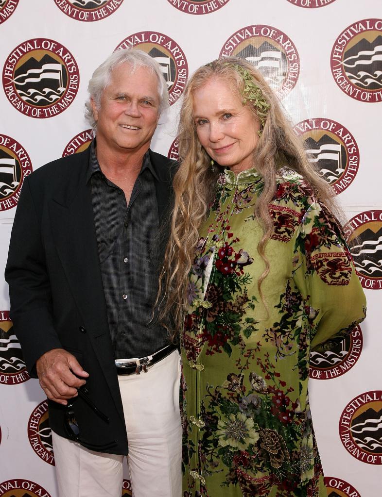 Tony Dow and his wife, Lauren Shulkind, on a red carpet together.