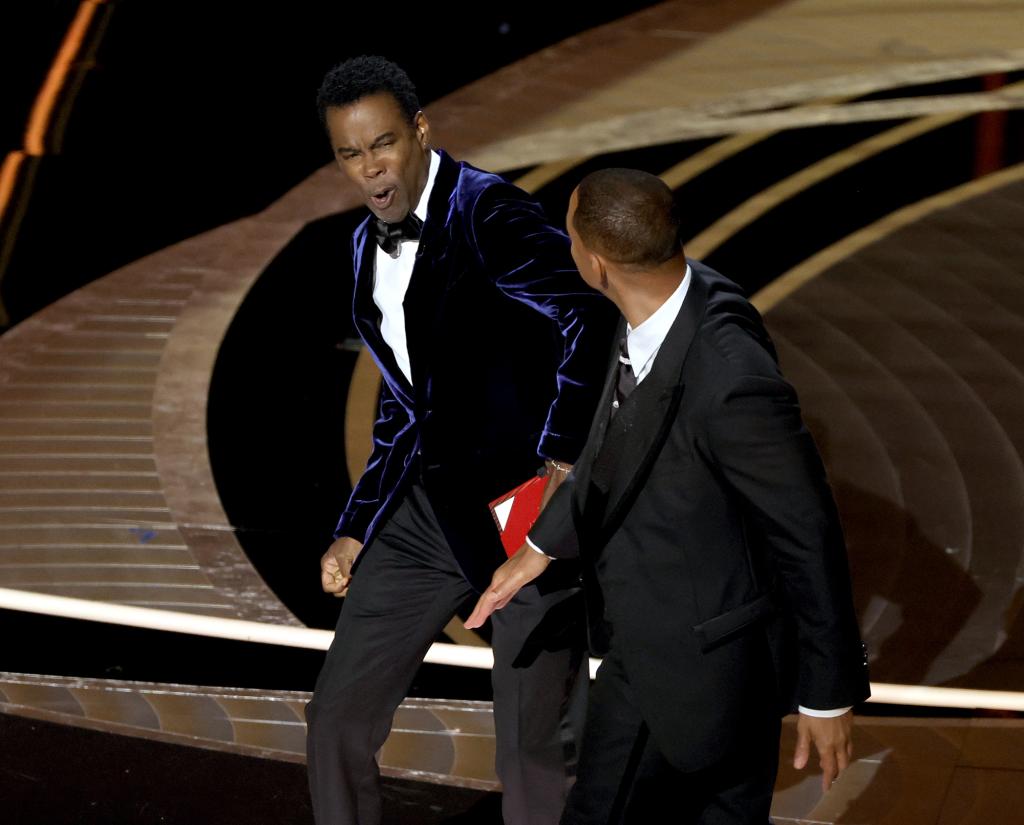 Will Smith slapping Chris Rock at the 2022 Oscars.