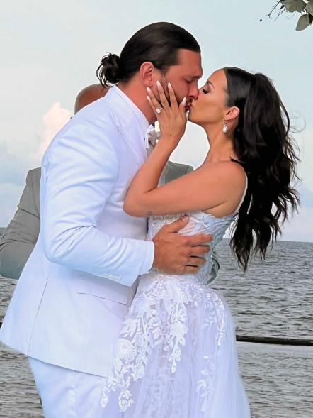Scheana Shay and Brock Davies kissing on their wedding day