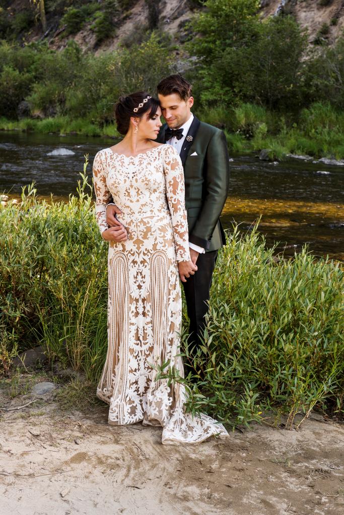 Katie Maloney and Tom Schwartz posing for a photo on their wedding day