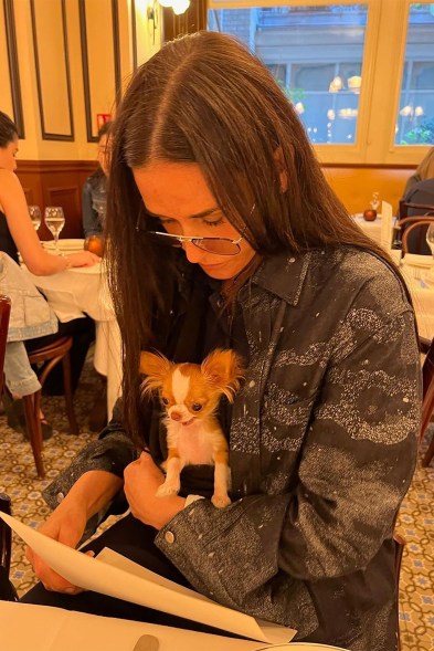 PUPPY IN HER POCKET?: Demi Moore treats Pilaf to a five-star dinner and, hopefully, a doggie bag for a late-night snack.