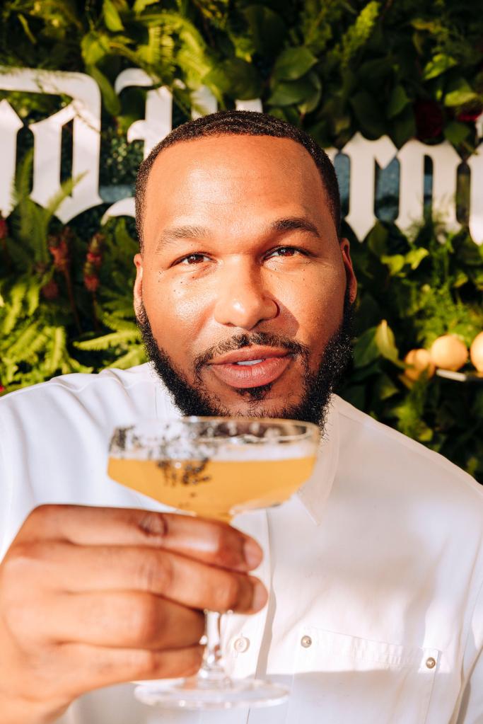 Jason Rembert with a cocktail