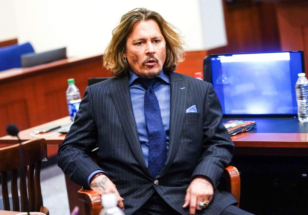 Johnny Depp sitting in court.