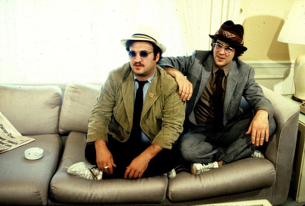 Wenner hired Aykroyd (right) to write an article for Rolling Stone after Carter's presidential victory.