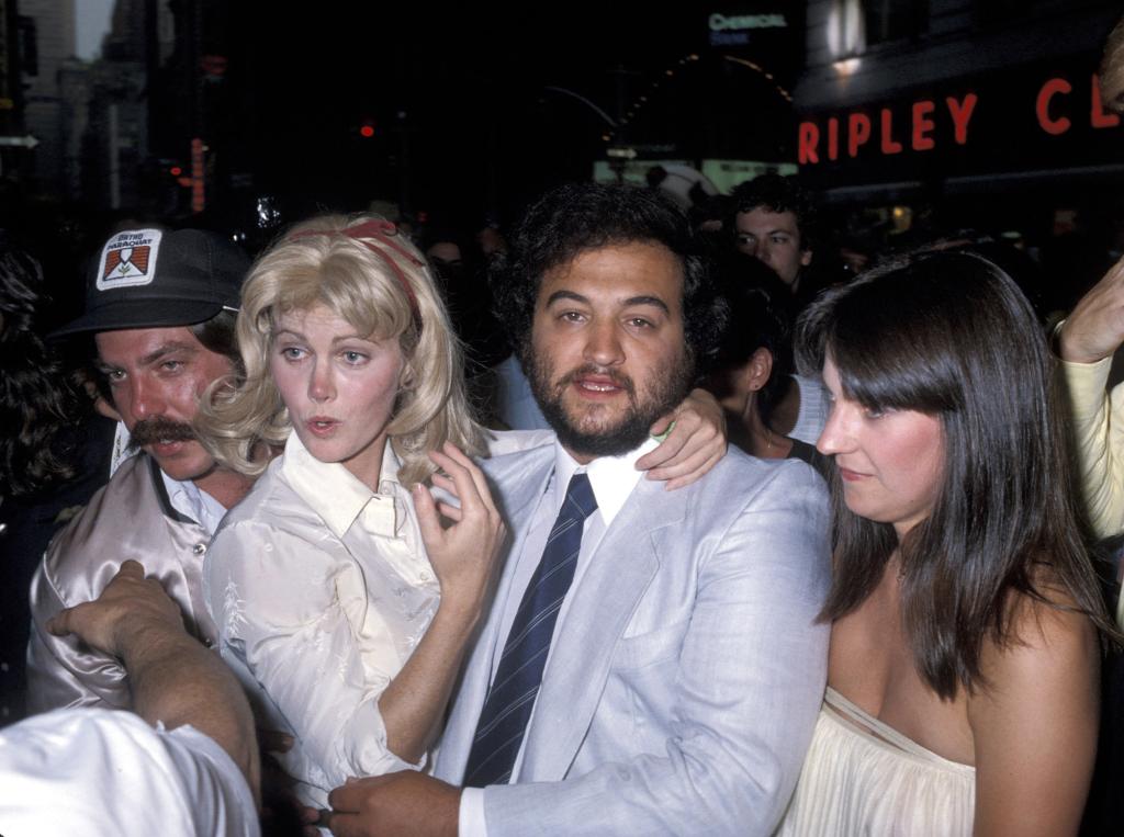 Wenner recalls a time when he visited Belushi (center) at the hospital when he was sidelined with a broken leg.