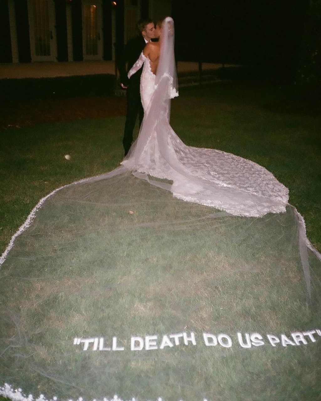 Justin Bieber and Hailey Bieber kissing on their wedding day