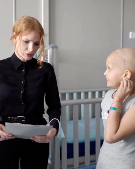 Jessica Chastain visiting a patient at the children's hospital in Kyiv