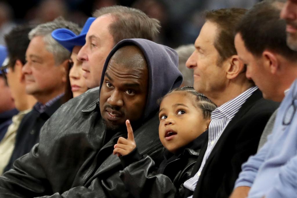 kanye west with saint at a game