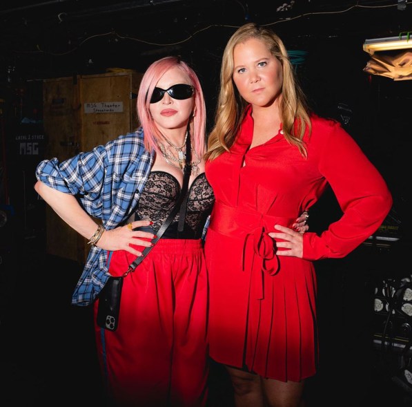 Amy Schumer (right) takes the opportunity to pose with Madonna almost too seriously.