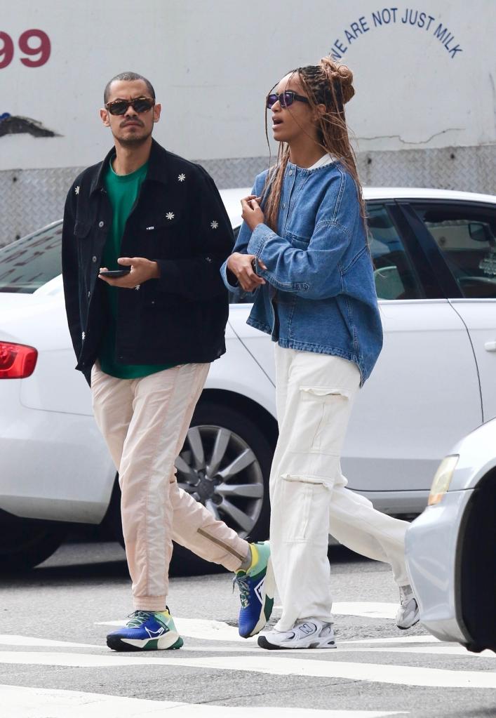 Malia Obama and Dawit Eklund walking together.