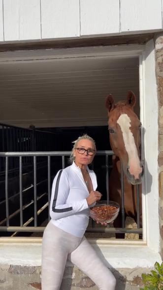 Yolanda Hadid eating almonds.