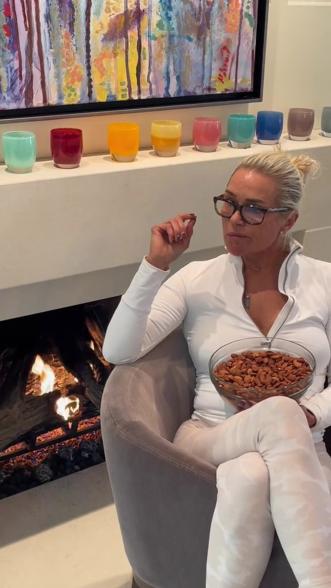 Yolanda Hadid eating almonds.