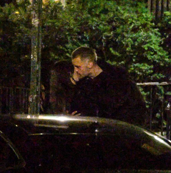 Emily Ratajkowski and DJ Orazio Rispo kissing.